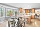 Well-lit kitchen with wood cabinets, stainless steel appliances, and eat-in breakfast area at 2051 Candlewood Ne Ct, Marietta, GA 30066