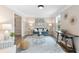 Cozy living room featuring a blue sofa, decorative rug, and stylish accents at 2051 Candlewood Ne Ct, Marietta, GA 30066