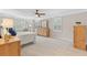 Spacious main bedroom features large windows, ceiling fan and decorative touches at 2051 Candlewood Ne Ct, Marietta, GA 30066