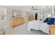 Large main bedroom boasts ample storage with multiple dressers and an adjoining walk-in closet at 2051 Candlewood Ne Ct, Marietta, GA 30066