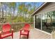 Inviting outdoor patio shows wooded views with room for seating with a convenient sliding glass door at 2051 Candlewood Ne Ct, Marietta, GA 30066