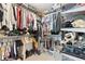 Well-organized walk-in closet provides generous storage with racks and shelving at 2051 Candlewood Ne Ct, Marietta, GA 30066