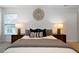 Bedroom showcasing a comfortable bed with decorative pillows and stylish bedside lamps at 4015 Brookhollow Dr, Douglasville, GA 30135