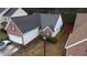 Charming single-Gathering home featuring a brick facade, attached garage, and well-manicured lawn at 4401 Chestnut Lake Ave, Lithonia, GA 30038