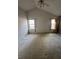 Bedroom with vaulted ceiling, natural light from two windows, carpet, and neutral walls at 4401 Chestnut Lake Ave, Lithonia, GA 30038