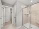 Modern bathroom featuring tiled shower with a frameless glass enclosure at 4958 Jatoba Rd, Acworth, GA 30101