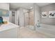 Bright bathroom with a double vanity, walk-in shower, and separate soaking tub is perfect for unwinding at 4958 Jatoba Rd, Acworth, GA 30101