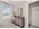 Serene bedroom featuring a dresser, soft natural light from the window, and a closet for ample storage at 4958 Jatoba Rd, Acworth, GA 30101