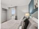 Comfortable main bedroom featuring soft lighting, a neutral palette, and an adjacent closet for optimal storage at 4958 Jatoba Rd, Acworth, GA 30101