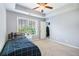 Bright bedroom with window and closet at 7620 Stoneridge Dr, Atlanta, GA 30328