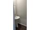 Powder room with modern pedestal sink and sleek fixtures, adding a touch of elegance to the home at 950 Sunny Lake Dr, Lawrenceville, GA 30043