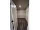 Walk-in closet with ample shelving and carpeted floor, ready for organization at 950 Sunny Lake Dr, Lawrenceville, GA 30043
