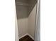 A compact closet featuring a wire shelf and ample space for storage solutions at 950 Sunny Lake Dr, Lawrenceville, GA 30043