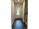 Inviting foyer showcasing wood floors and a staircase, creating a warm and welcoming entrance at 950 Sunny Lake Dr, Lawrenceville, GA 30043