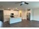 Spacious kitchen with white cabinets, stainless steel appliances, and a kitchen island at 950 Sunny Lake Dr, Lawrenceville, GA 30043
