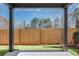 Covered outdoor patio with a view of the fenced-in backyard at 2540 Silver Star Ne Dr, Marietta, GA 30066