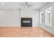 Bright living room with a modern fireplace and large windows at 2540 Silver Star Ne Dr, Marietta, GA 30066