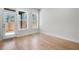 Bright room with hardwood floors and a glass door to the outdoor patio at 2540 Silver Star Ne Dr, Marietta, GA 30066