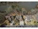 Aerial shot of luxurious homes in a neighborhood overlooking a serene lake at 2674 Hosanna Dr, Powder Springs, GA 30127