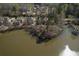 An aerial view showing homes bordering the water, and wooded privacy for upscale living at 2674 Hosanna Dr, Powder Springs, GA 30127
