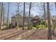Spacious backyard with mature trees and landscaping at 2674 Hosanna Dr, Powder Springs, GA 30127