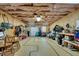 Unfinished basement providing ample storage space with exposed ceiling and concrete flooring at 2674 Hosanna Dr, Powder Springs, GA 30127