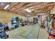 Spacious unfinished basement with plywood walls and ceiling, offering customizable storage at 2674 Hosanna Dr, Powder Springs, GA 30127