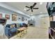 Comfortable basement with plush blue seating, home entertainment system, and recessed lighting at 2674 Hosanna Dr, Powder Springs, GA 30127
