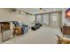 Inviting finished basement area featuring a large seating area, wet bar, and neutral decor at 2674 Hosanna Dr, Powder Springs, GA 30127