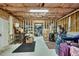 Partially finished basement with exposed framing, offering versatile storage solutions at 2674 Hosanna Dr, Powder Springs, GA 30127
