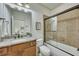 Cozy bathroom with granite countertop sink, shower/tub combo, and neutral tones at 2674 Hosanna Dr, Powder Springs, GA 30127
