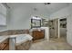 Bathroom with soaking tub, walk-in glass shower and walk-in closet with custom shelving at 2674 Hosanna Dr, Powder Springs, GA 30127