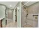 Elegant bathroom featuring a spacious shower with marble tile surround and bronze fixtures at 2674 Hosanna Dr, Powder Springs, GA 30127