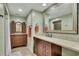 Bathroom with vanity, mirror, and tile flooring at 2674 Hosanna Dr, Powder Springs, GA 30127