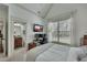 Bedroom with vaulted ceiling, TV and ensuite bathroom at 2674 Hosanna Dr, Powder Springs, GA 30127