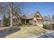 Beautiful home with a three-car garage, manicured lawn, and an appealing mix of siding and stone exterior at 2674 Hosanna Dr, Powder Springs, GA 30127