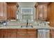 Close-up of the beautiful kitchen features stainless steel appliances and granite countertops at 2674 Hosanna Dr, Powder Springs, GA 30127