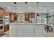 Modern kitchen with stainless steel appliances, a central island, and stylish pendant lighting at 2674 Hosanna Dr, Powder Springs, GA 30127