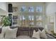 Cozy living room space boasting a lake view, neutral tones, and comfortable overstuffed seating at 2674 Hosanna Dr, Powder Springs, GA 30127