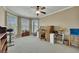 Bright office space with a vintage desk, natural light, and comfortable furnishings at 2674 Hosanna Dr, Powder Springs, GA 30127