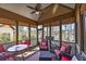 Inviting sunroom with great views of the backyard and lake at 2674 Hosanna Dr, Powder Springs, GA 30127