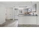 Open concept kitchen with sleek countertops and modern appliances at 66 Fair Haven Se Way, Smyrna, GA 30080