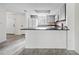 Open concept kitchen with sleek countertops and modern appliances at 66 Fair Haven Se Way, Smyrna, GA 30080