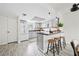 Clean kitchen features stainless appliances, breakfast bar seating, and light gray cabinets at 66 Fair Haven Se Way, Smyrna, GA 30080