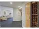 Basement area that features a wine rack, sitting area, and access to other parts of the home at 80 Seville Chase, Atlanta, GA 30328