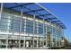 Sandy Springs Performing Arts Center showcases a modern glass and steel design against a clear blue sky at 80 Seville Chase, Atlanta, GA 30328