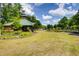 Community Pavilion offers a covered gathering space surrounded by landscaped gardens and open green space at 80 Seville Chase, Atlanta, GA 30328