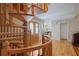 Elegant foyer featuring a spiral staircase and hardwood flooring at 80 Seville Chase, Atlanta, GA 30328