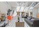 Living room with many skylights and windows, letting in an abundance of natural light at 80 Seville Chase, Atlanta, GA 30328