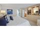 A bright and open main bedroom, decorated in soft neutral colors at 80 Seville Chase, Atlanta, GA 30328